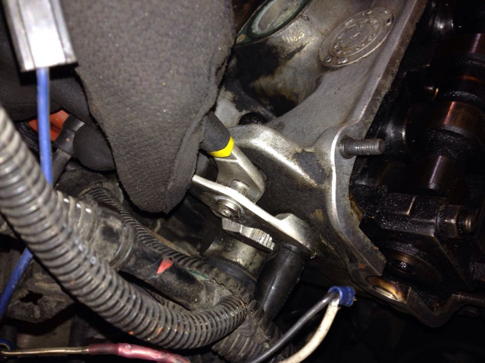 With a monkey wrench, loosen "---" sensor.