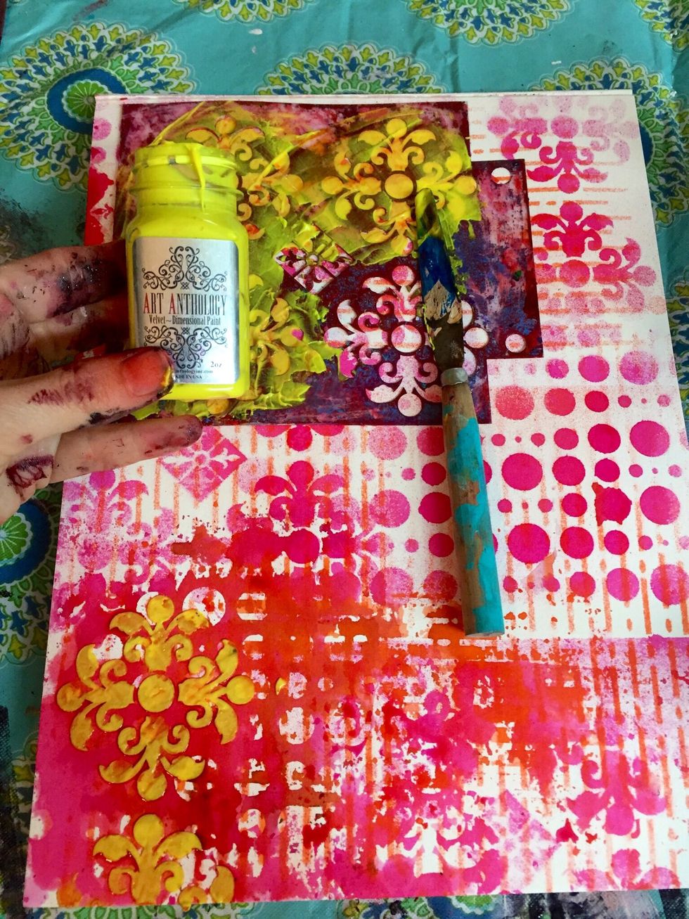 With a palette knife using Art Anthology's Rosette stencil and Art Anthology's Velvet in Lemon Tart add to the page.