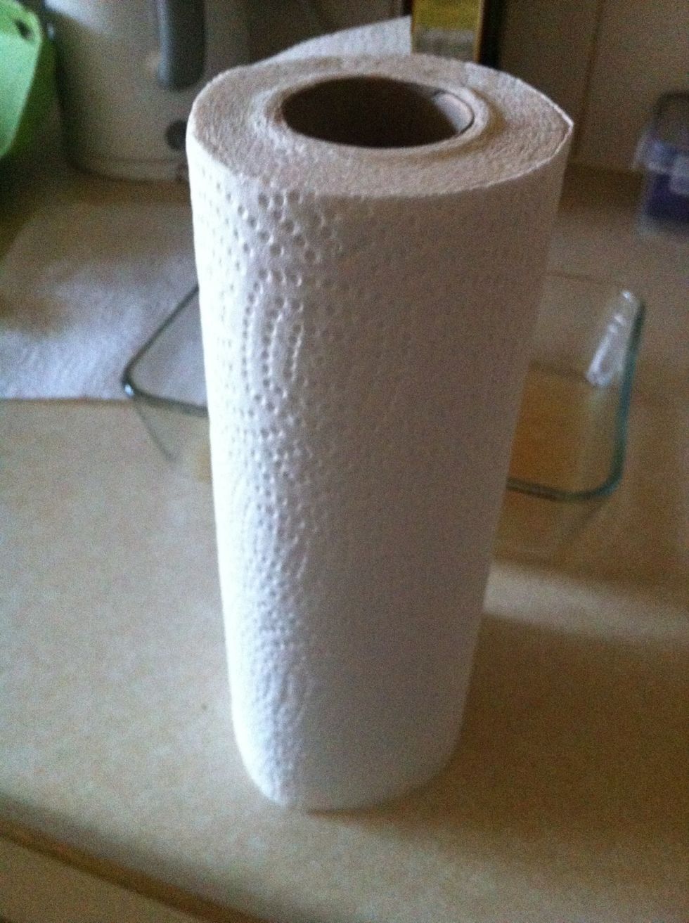 With a paper towel wipe off all the oil you just put on until you can not get anymore off. There will be a fine layer left. Too much oil will smoke and set the fire alarms off.