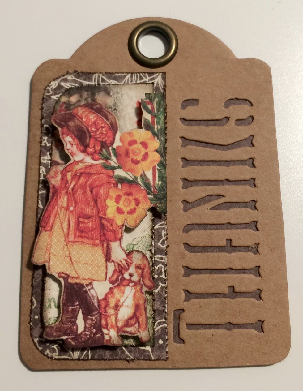 With a second brown thanks tag, foam square the girl with dog overtop of the middle of the fall paper.