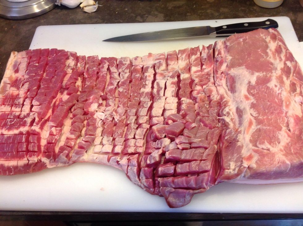 With a sharp knife, score the inside in a checker board pattern 1/3" deep. Rub dry-rub all over the scored inside and generously season with salt & pepper. Then flip over and score the skin side too.