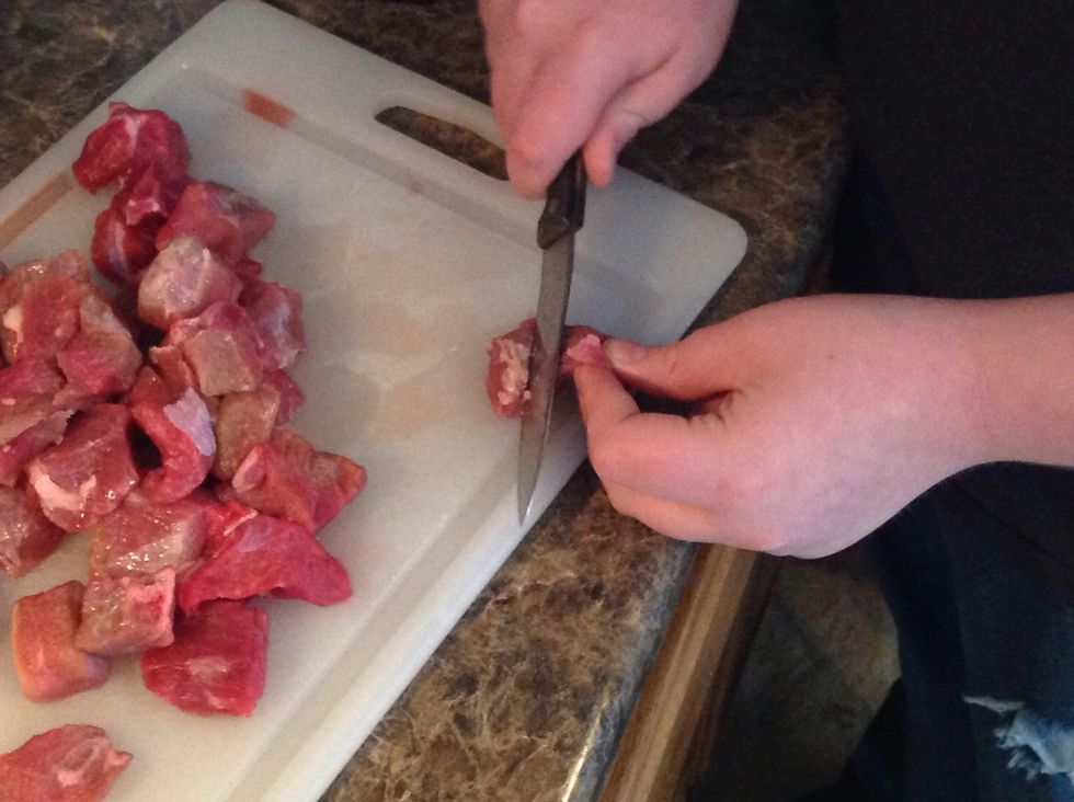 With a sharp knife, trim the fat off of the small chunks of meat. Throw away the pieces of meat that are mostly fat.