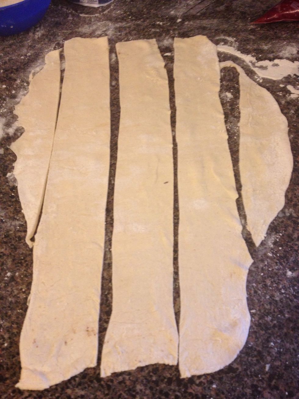 With a small knife, cut th dough in lines that are 1 1/2 inch thick.