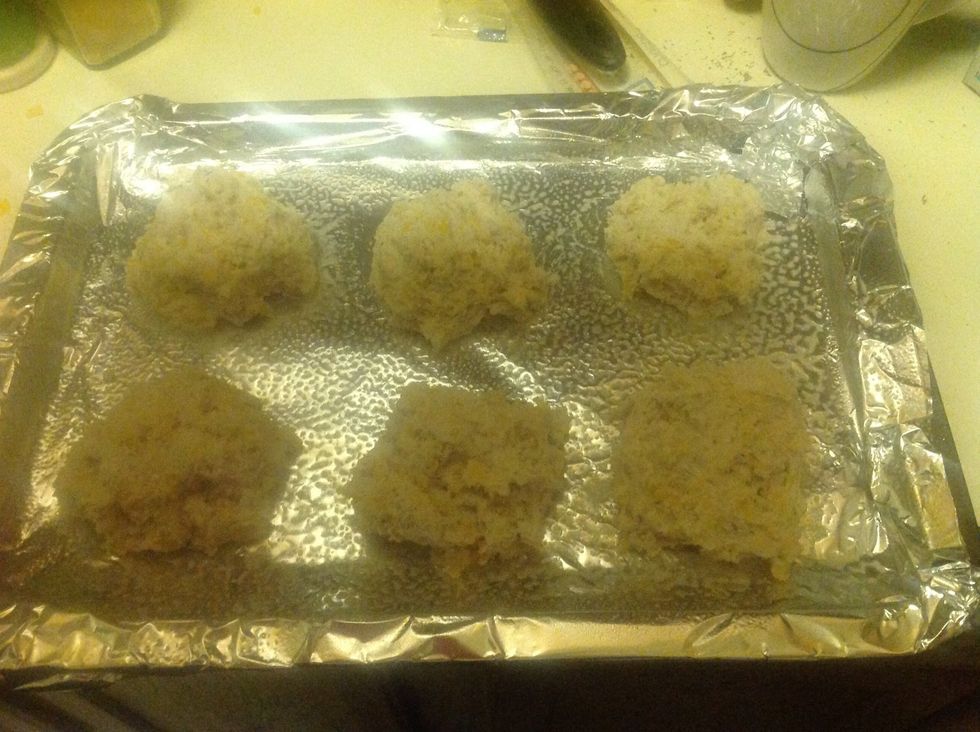 With a spoon or your fingers shape the dough into clumps and place them on the baking sheet. If you would like them to be uniform you can pat down the peaks--the dough will hold its shape when baked.