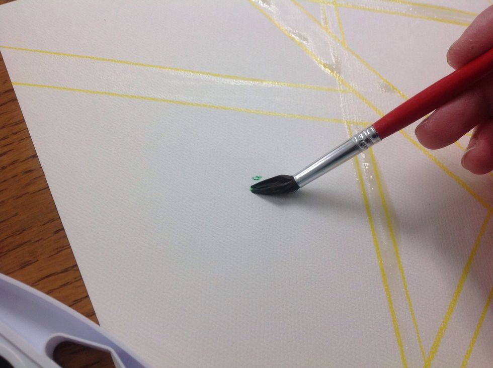 With a wet brush, paint on the watercolor. You need enough water to keep the paint flowing, but do not soak the paper!