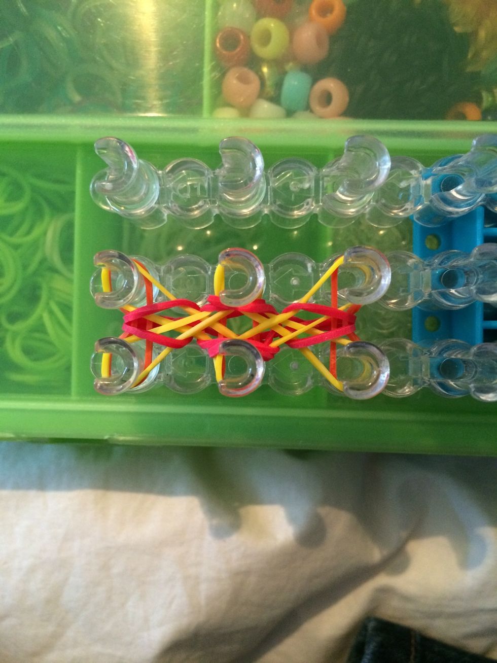 With all 8 ends pull over push down all your bands.