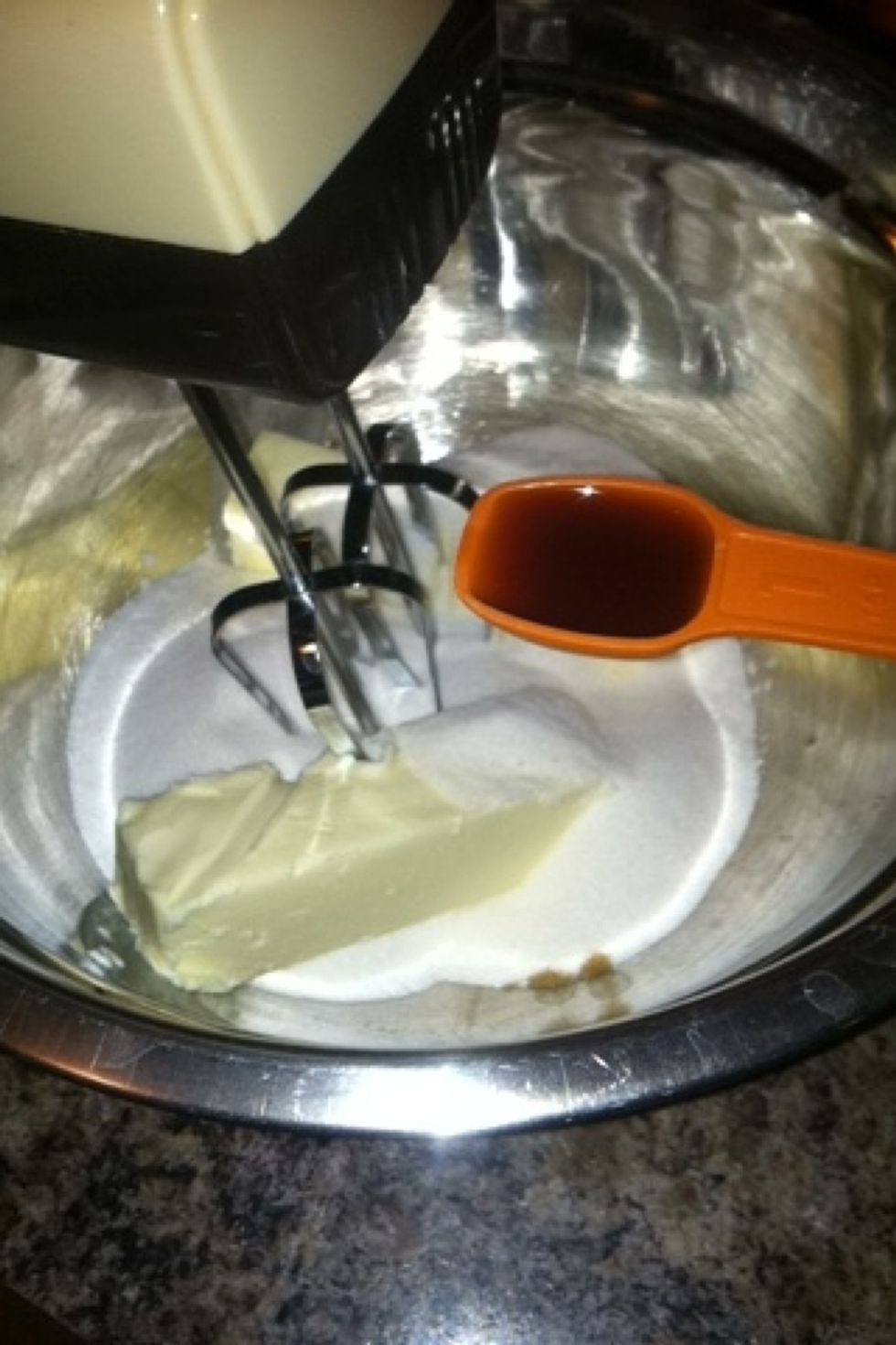 With an electric mixer, cream 1 cup of butter and 1 1/4 cup sugar on medium-high speed until smooth; beat in vanilla until combined
