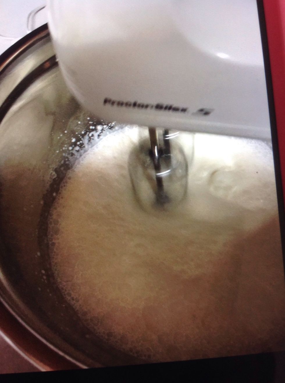 With an electric mixer on high mix the cream and sugar together