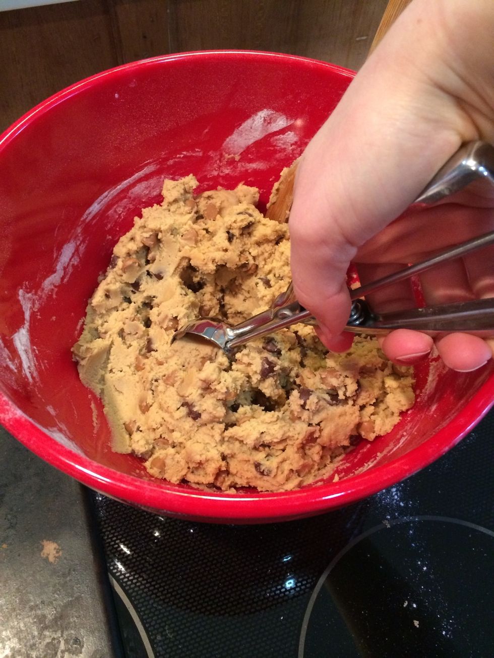 With an ice cream scooper or spoons, scoop out rounded spoonfuls and place the on cookie sheets