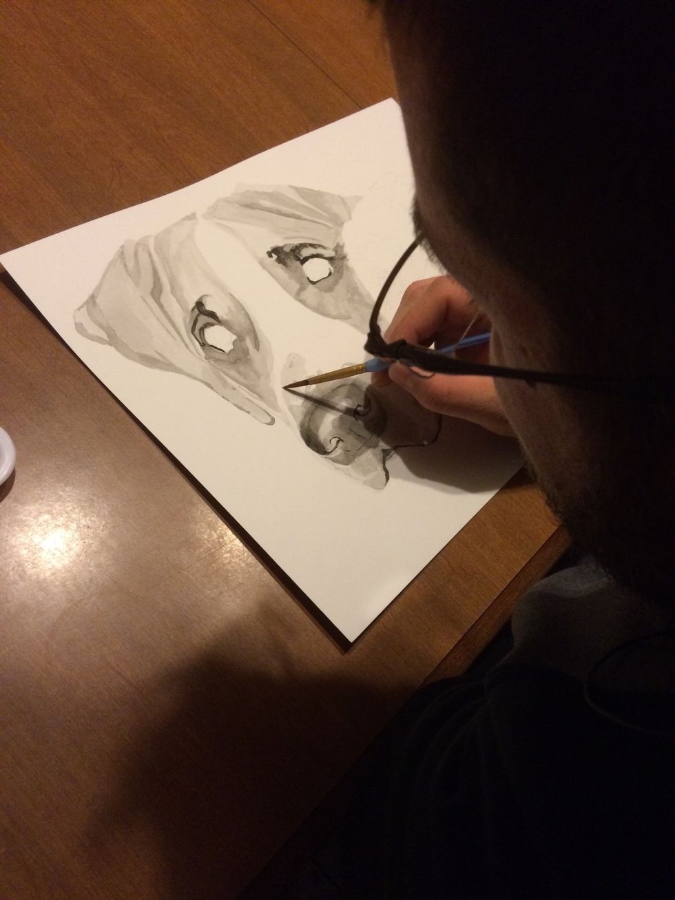 With an ink wash you work in layers. You start out with a very light wash. Each layer over top of that will cause the same area to get darker and darker. Working with light color prevents mistakes.