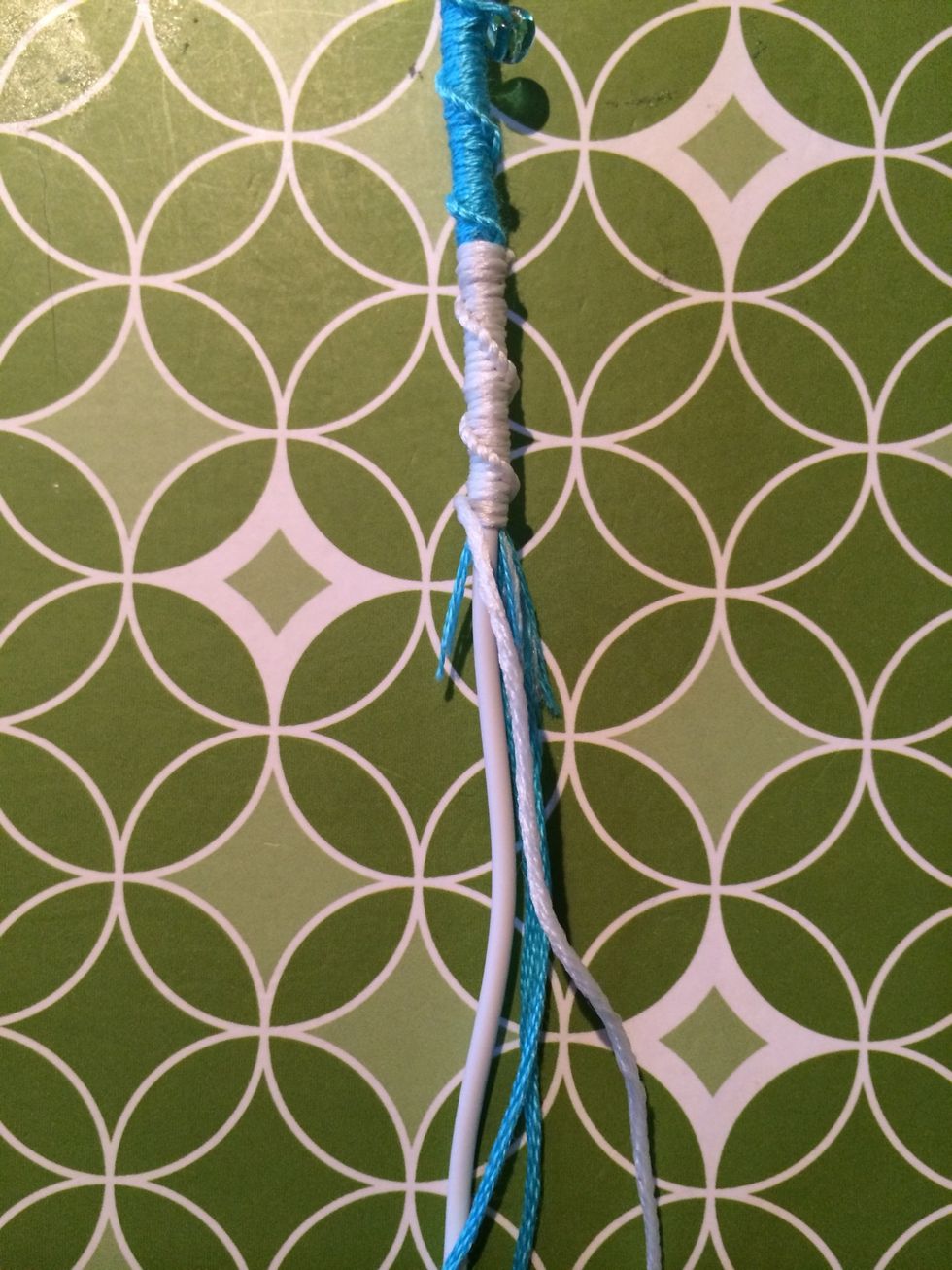 With another set done it's starting to look really nice. I am also reaching the end of my tail. You want to be careful and make sure you knot over all the strings so we hide what we don't want to see.