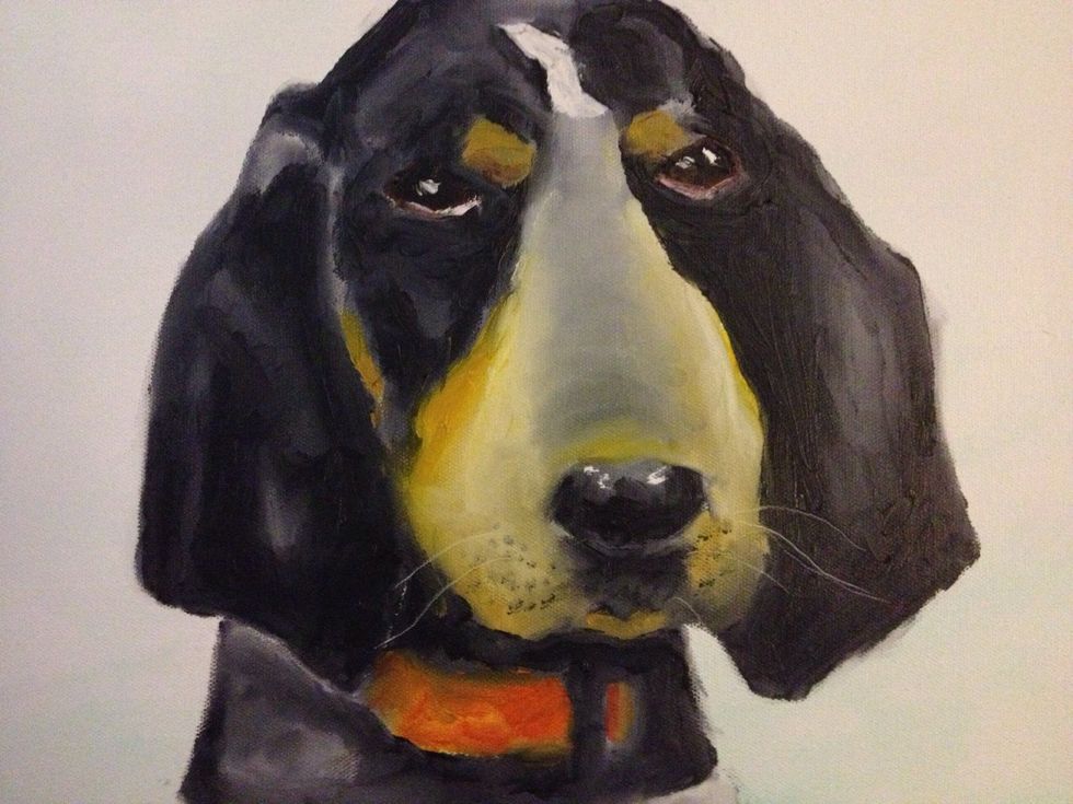 With black on your pinky, add some whisker dots round the nose. Grab your paint or putty knife and scrape in some whiskers!