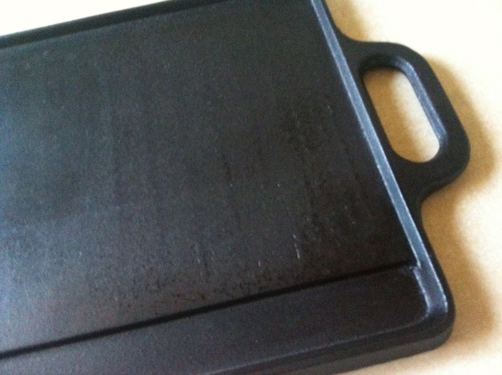 With continued use the pan will gain a shiny gloss. Never put cast iron into the dish washer. Water, a little soap and a light scouring will be enough to clean it.