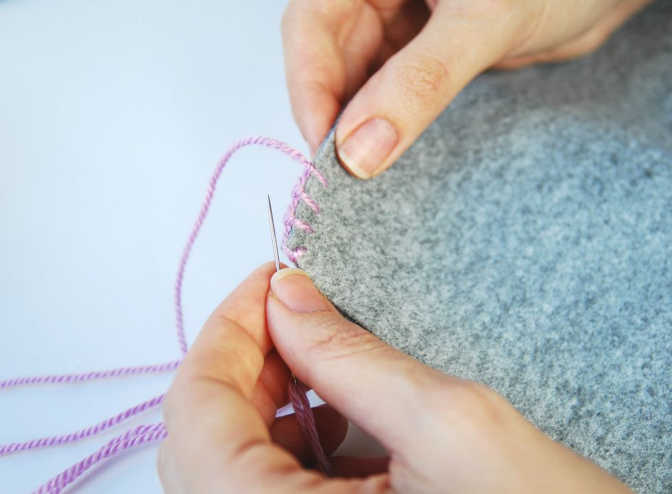 with embroidery thread sew the two sectors - decorative stitch fabric that fits close the edges without hem. You can also decorate decorative embroidery cushion over any shape or image of your choice