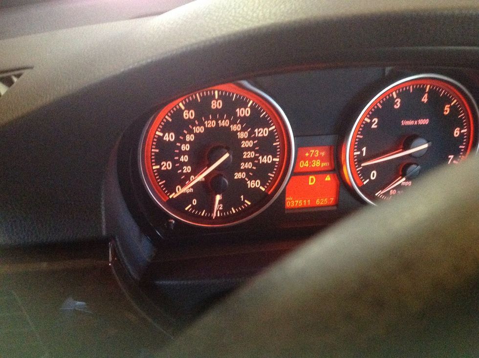 With foot still on brake, put vehicle into drive