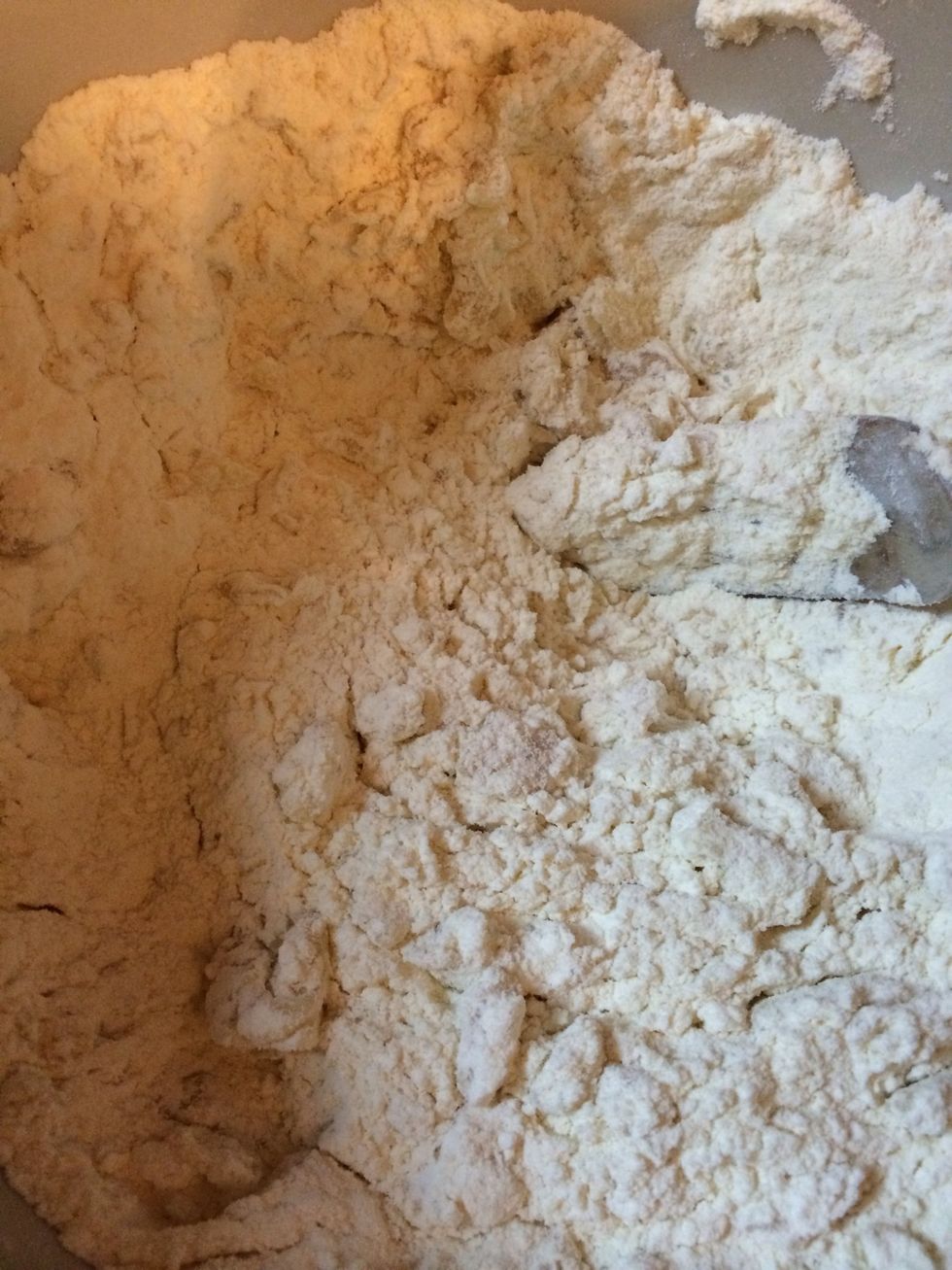 With fork mash the fat into the flour. See the flour starts to create these pebbles?