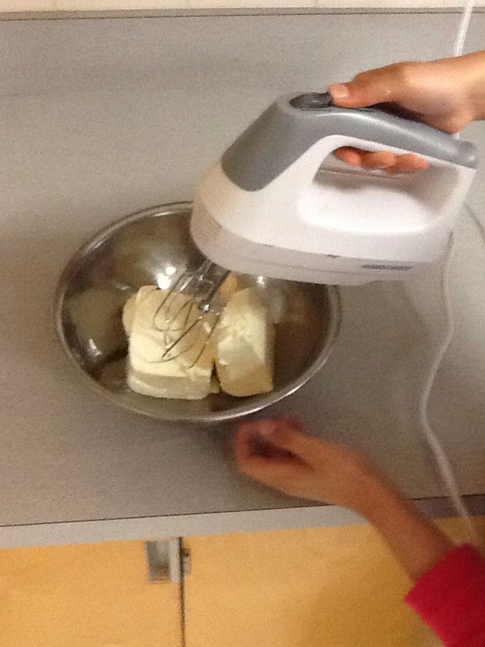 With hand mixer beat cream cheese until smooth and fluffy