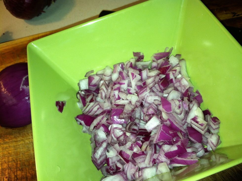 With one half of the onion cut it up into small finely chopped pieces.