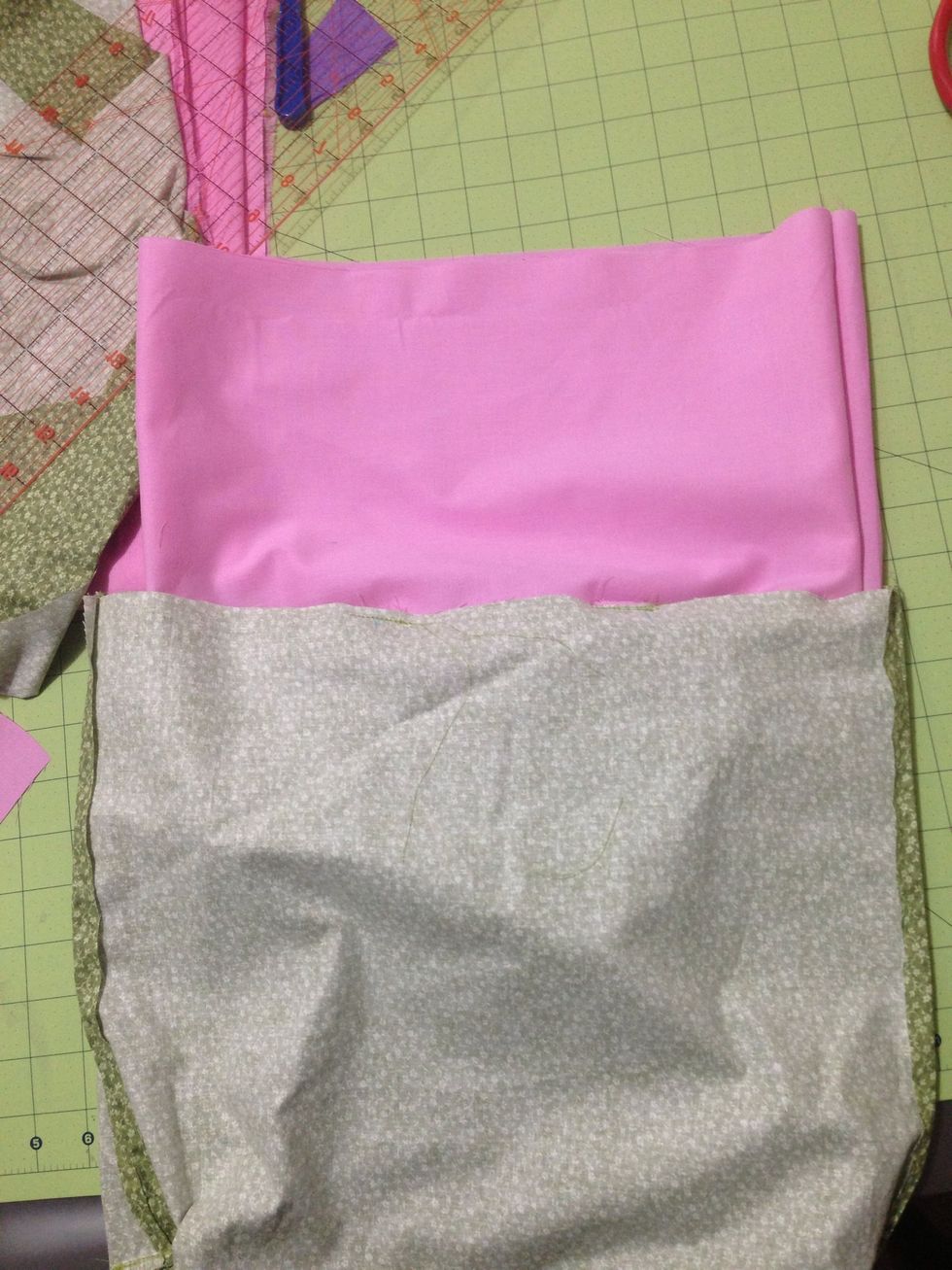 With right sides facing each other insert lining into bag matching up the side seams.