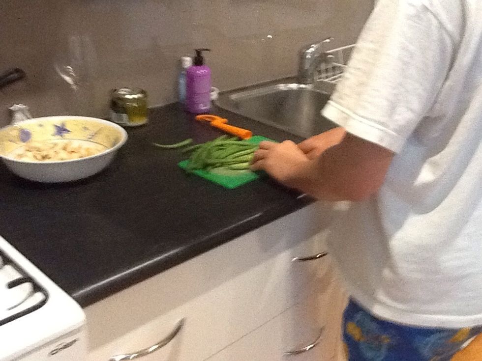 With the beans simply cut off both ends and cut in half