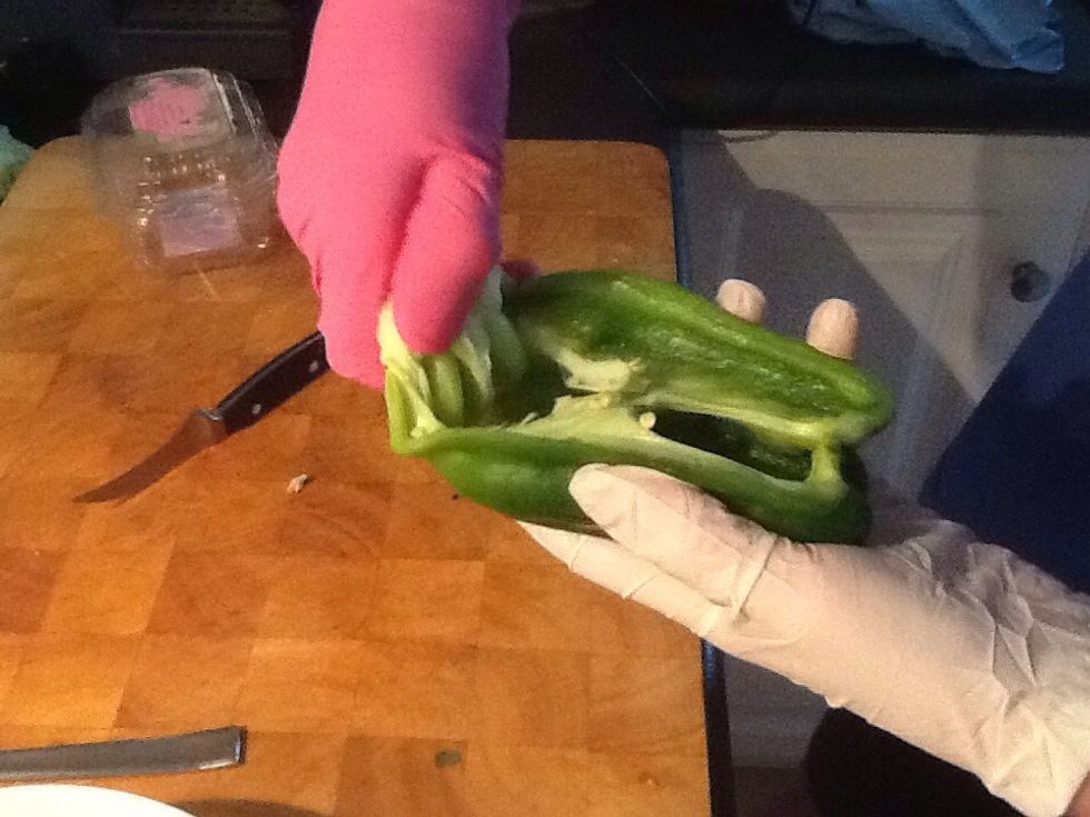 With the capsicum, pull the root part out. (like so)