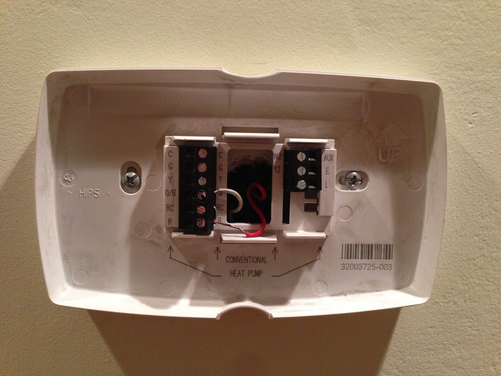 With the damaged Honeywell thermostat faceplate removed I began by documenting where there original wires were connected, this is very useful later!