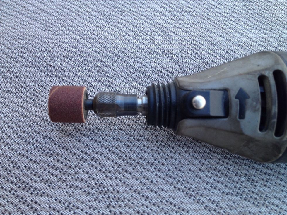 With the Dremel, I will be using a drum sander attachment. This one is probably 100 to 120 grit.