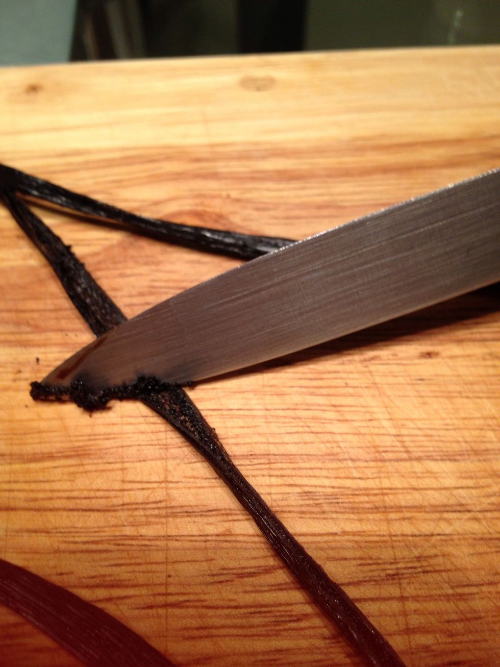 With the dull side of a knife, scrape out the seeds. These little black dots are divine!