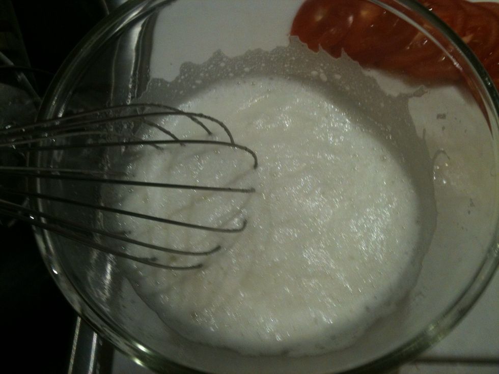 With the egg whites. Beat them until fluffy.