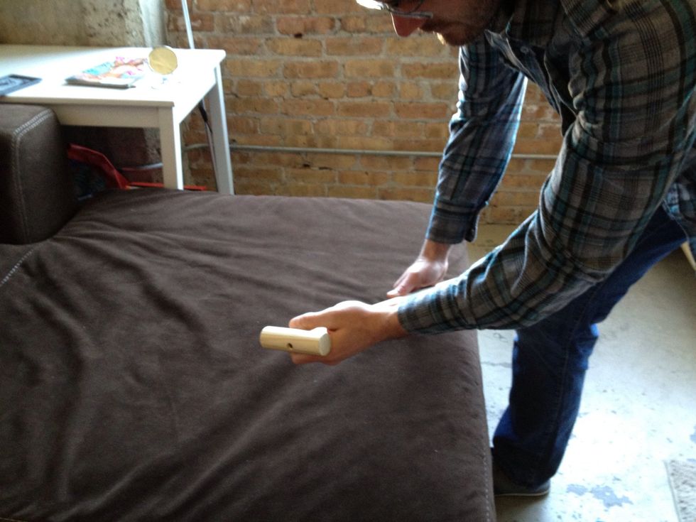 With the excess dowel cut a 4" piece and with a wood screw and drill attach it to the top of the dowel.