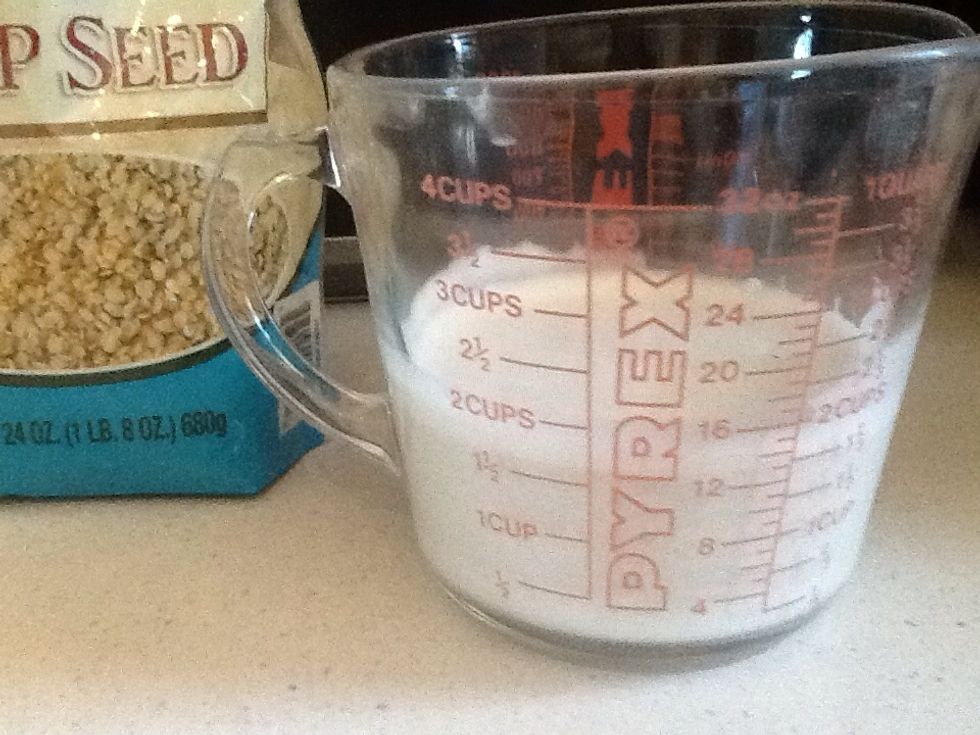 With the hemp milk, add the vanilla and guar gum.