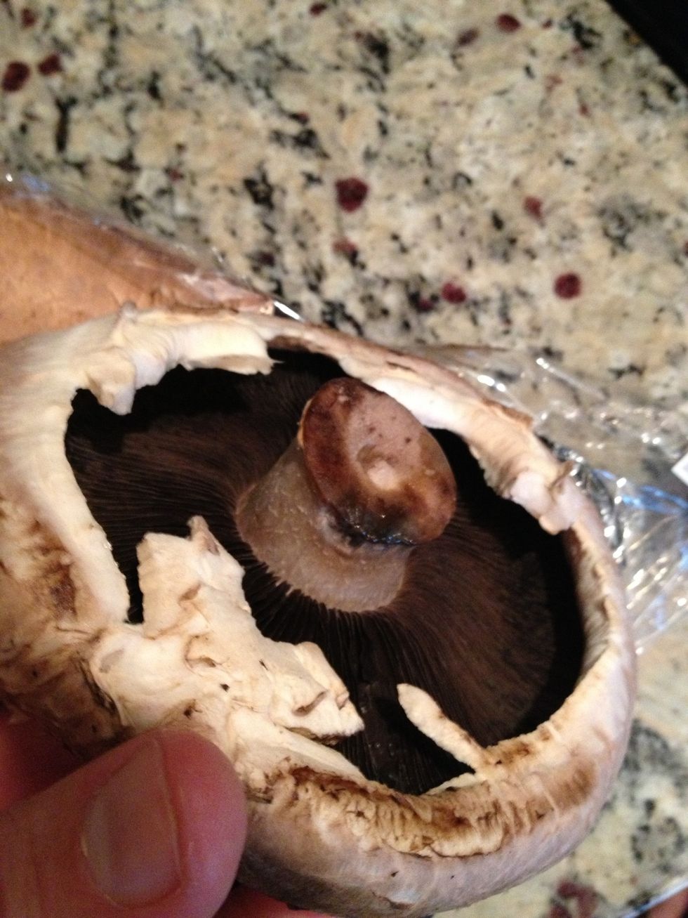 With the mushrooms, cut the stems down as close as possible to the mushroom top. (Photo is before being cut)