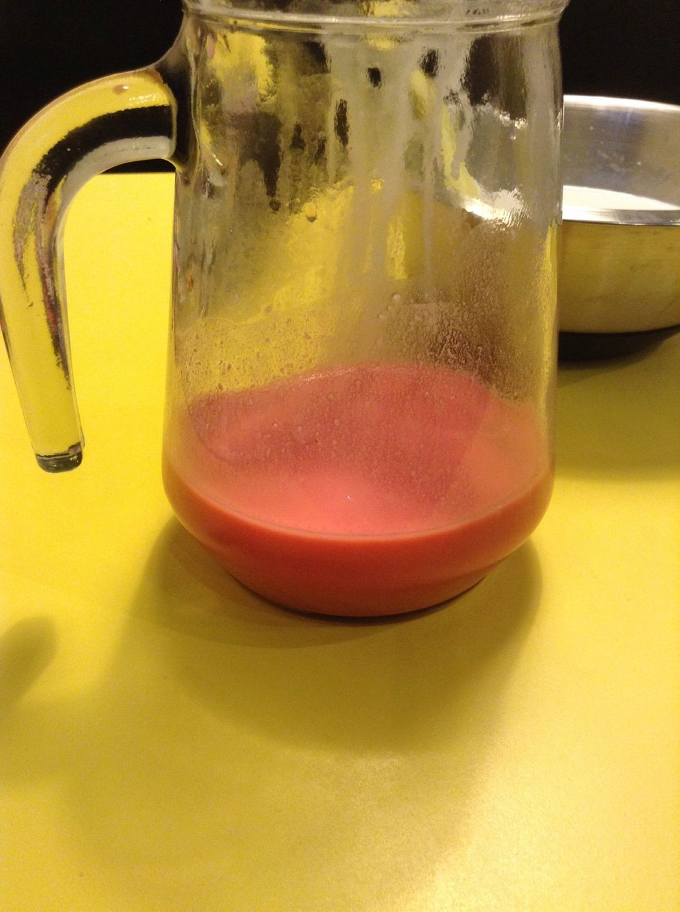 With the other half of the red jello, mix 4 spoons of the condensed/coconut milk mixture.