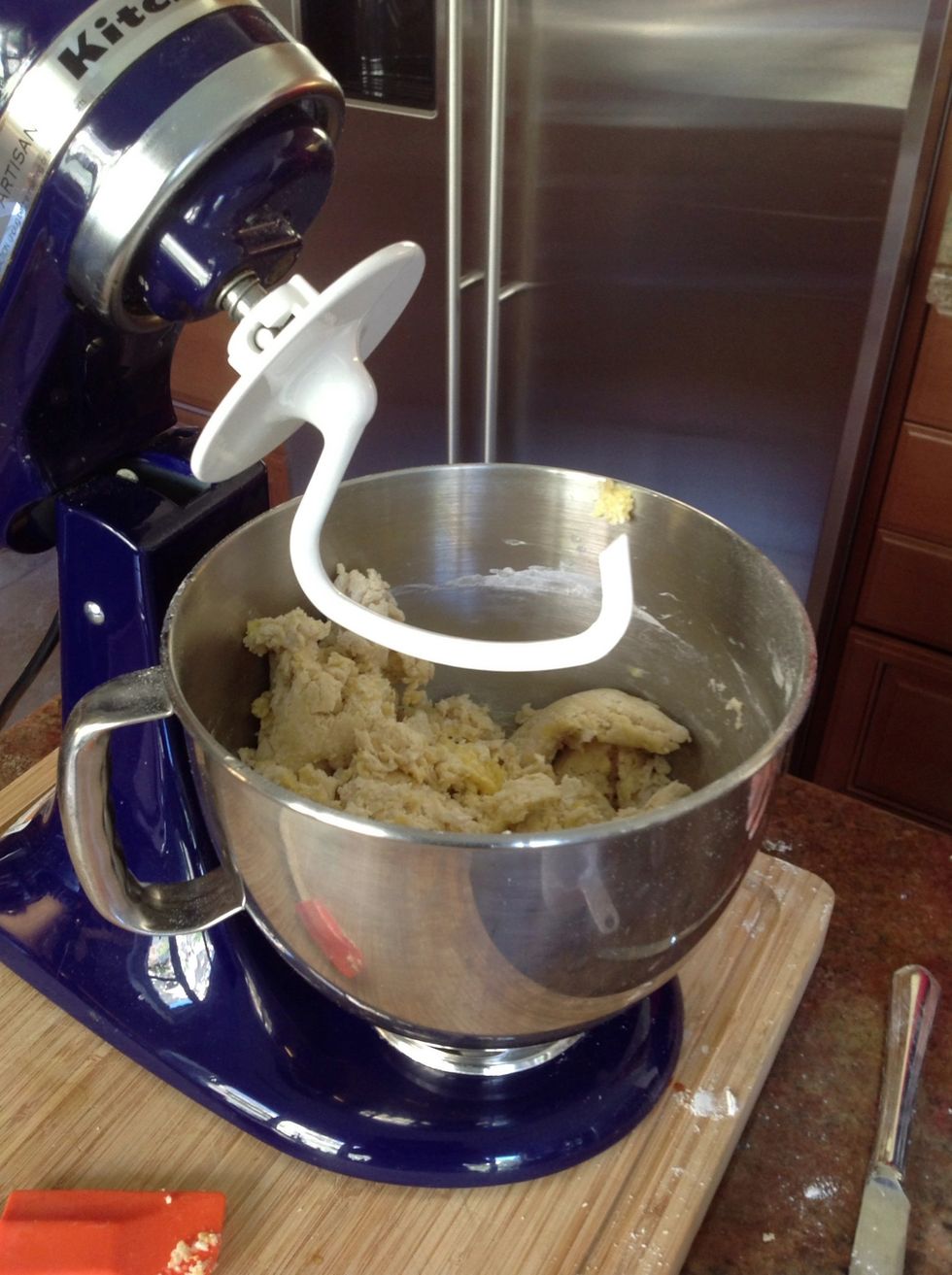 With the paddle attachment (not pictured), blend flour and egg mixture for 30 seconds. Switch to the hook and mix for 2 minutes. If mixture is to dry add a little water or olive oil.