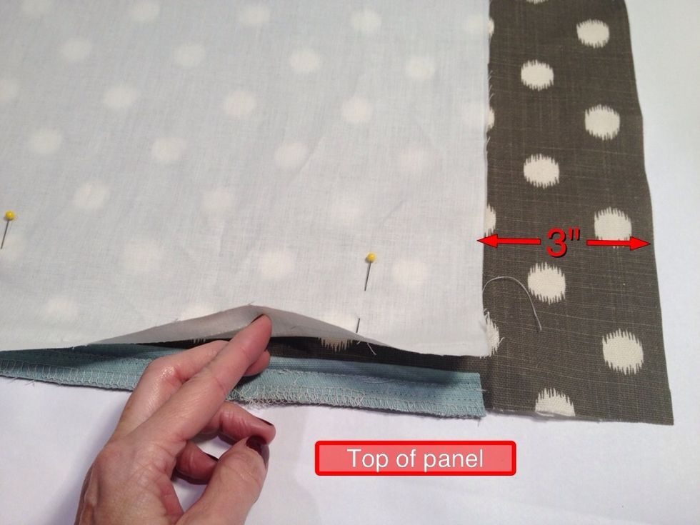 With the right side of the fabric facing up, place the lining right side down aligning the top edges. The lining will be inset 3" on each side. Pin all layers together across the top of the panel.