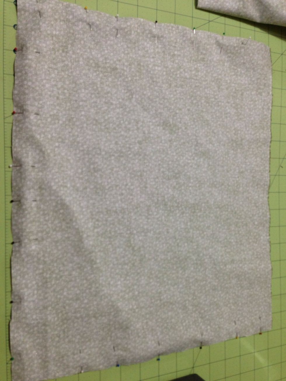 With the right sides facing each other & pin both sides & bottom together. & starting at top of one of the sides sew, backstitching at beg & end, sew around turning at the corners.