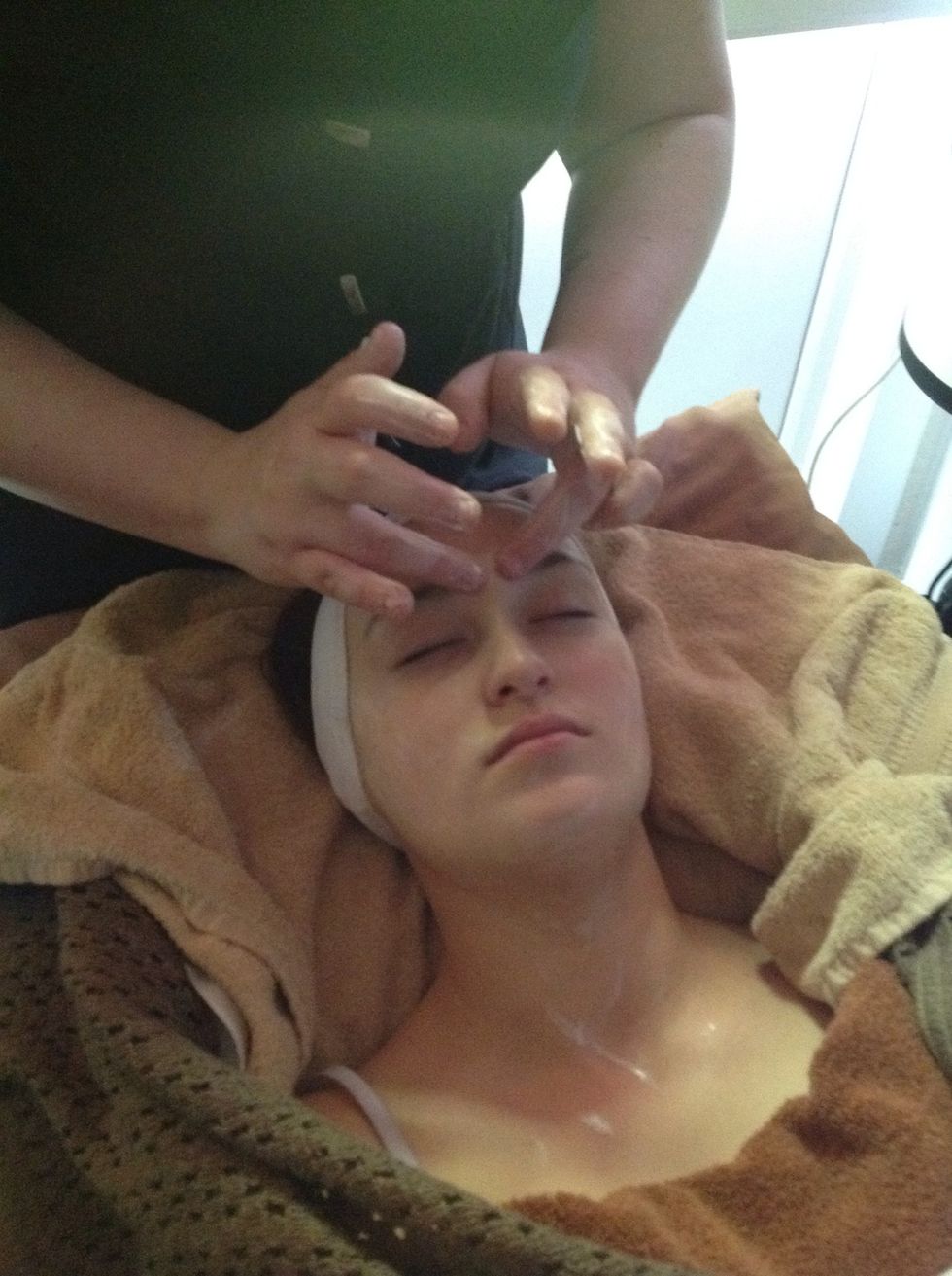 With the ring finger, circle upwards and outwards around the eye.