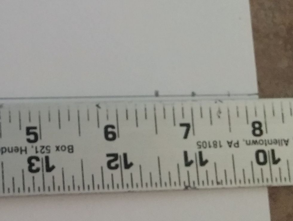 With the ruler along the horizon line make a mark at 6 1/2 and 7 inches. This is the second perspective point.