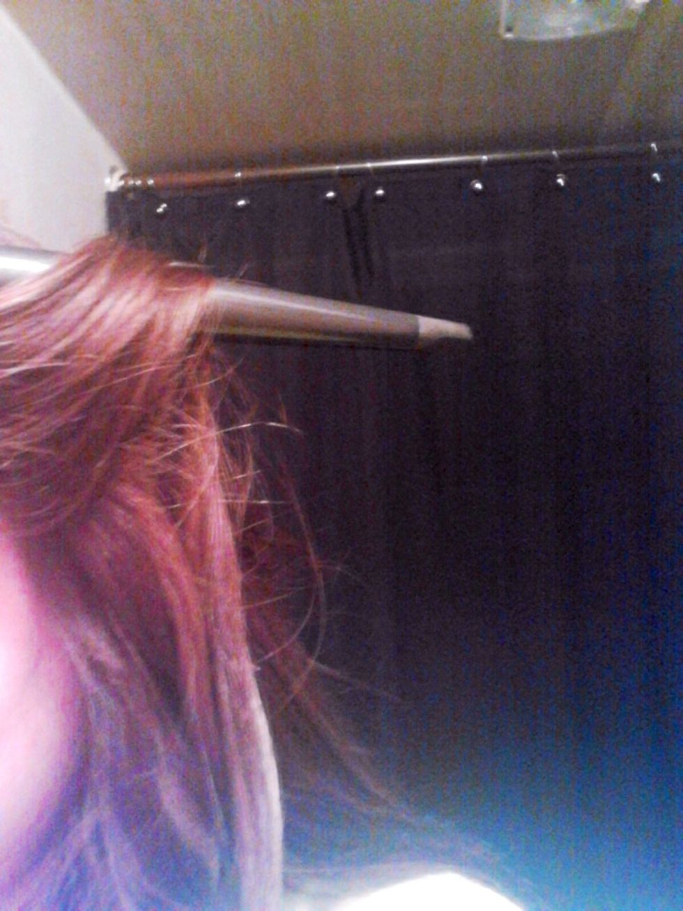 With the top section of hair, place the wand behind sections of hair every time using the same "over and under" technique. This will create more volume and beautiful curls!