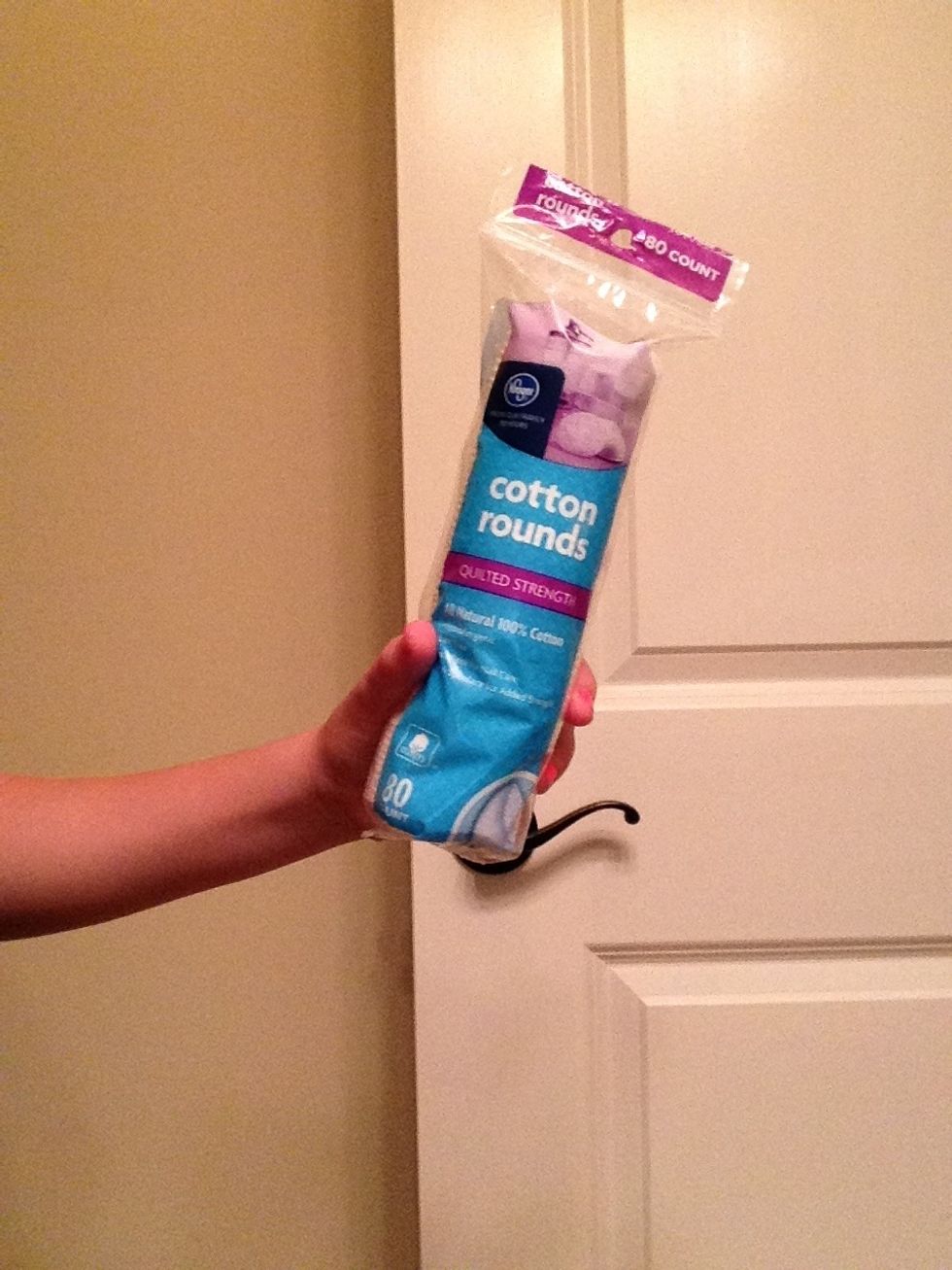 With these cotton pads.