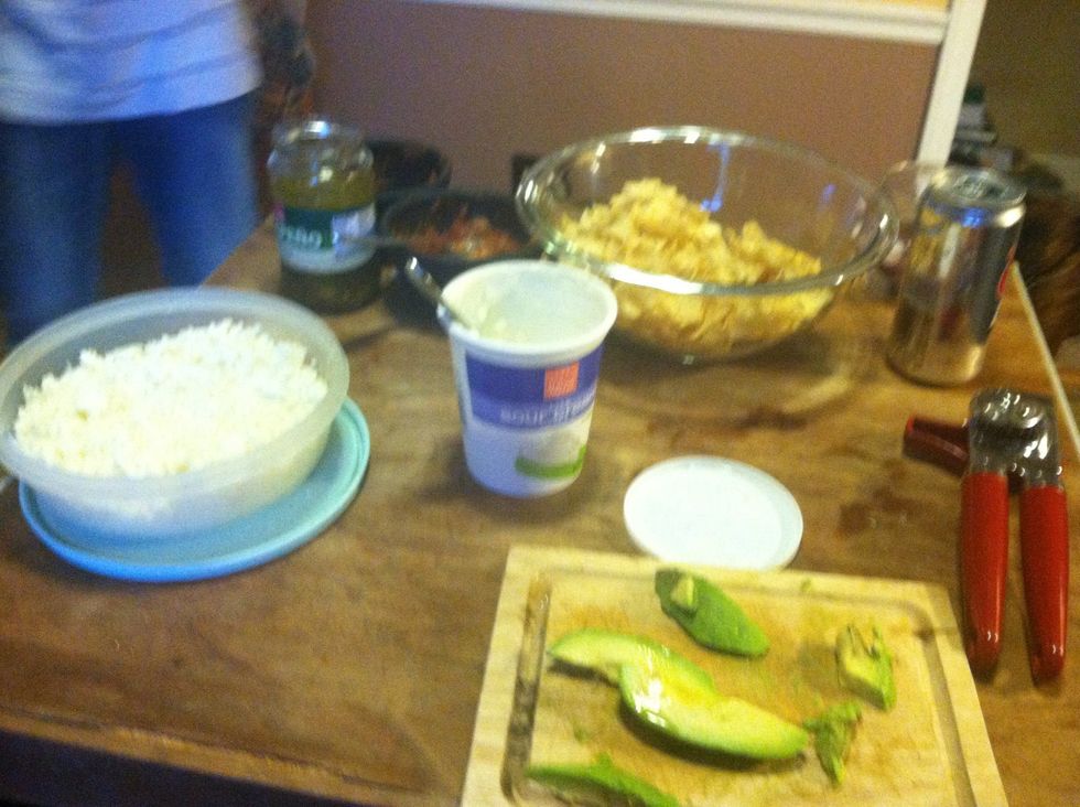 With warm tortillas add pork, cheese, avocado, sour cream, salsa and jalape\u00f1os!!