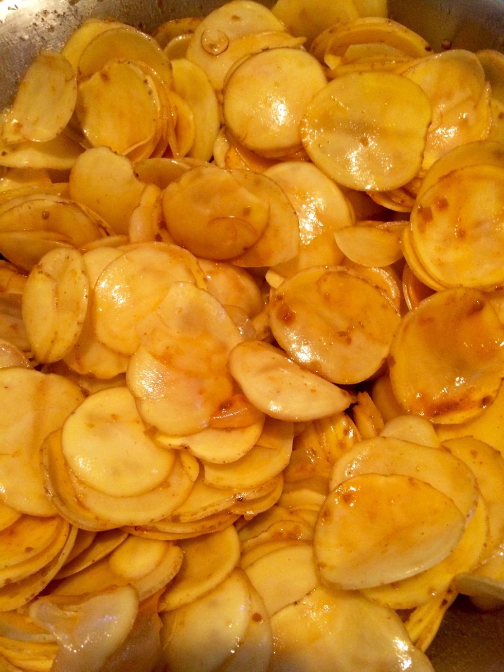 With your hands, mix everything together until the oil, vinegar, and hot sauces are coating the chips.
