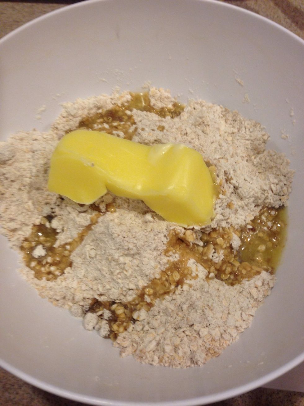 With your hands, mix  until everything's incorporated. (I didn't add an egg when I made this but I think a beaten egg can be added here to help further bind the crumble together.)