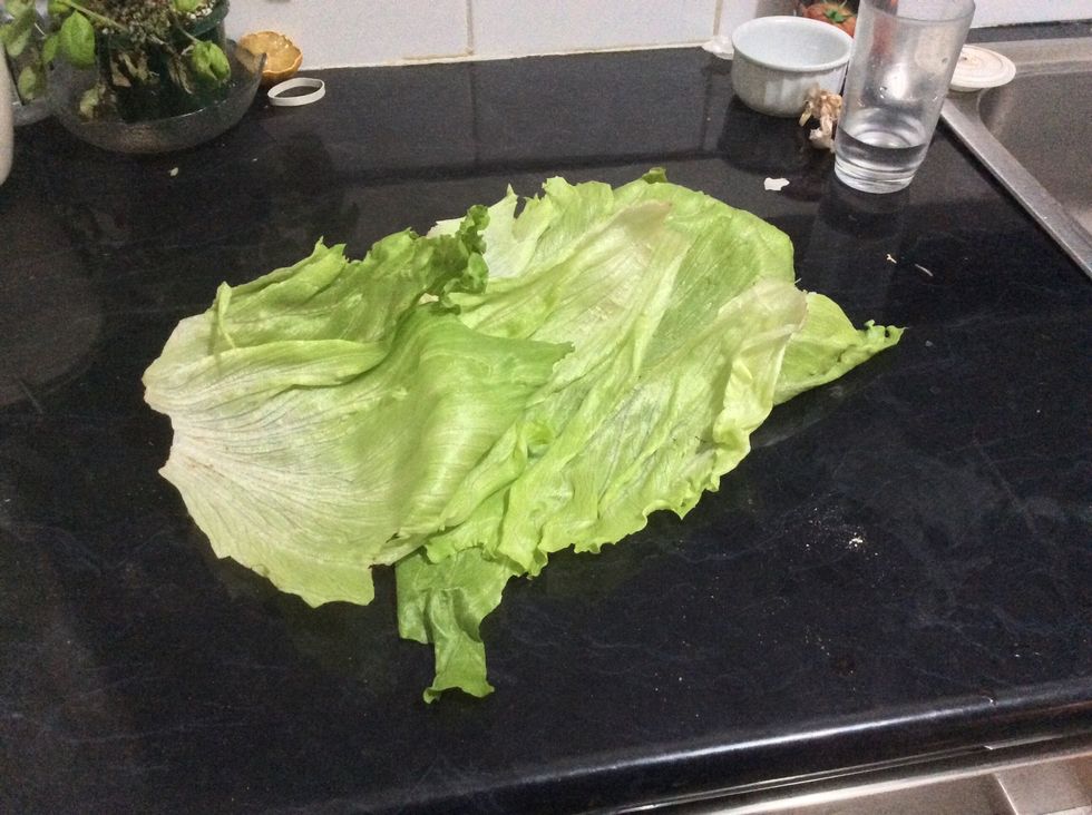 With your lettuce start peeling the leaves off. Put them onto a plate so they are in reach
