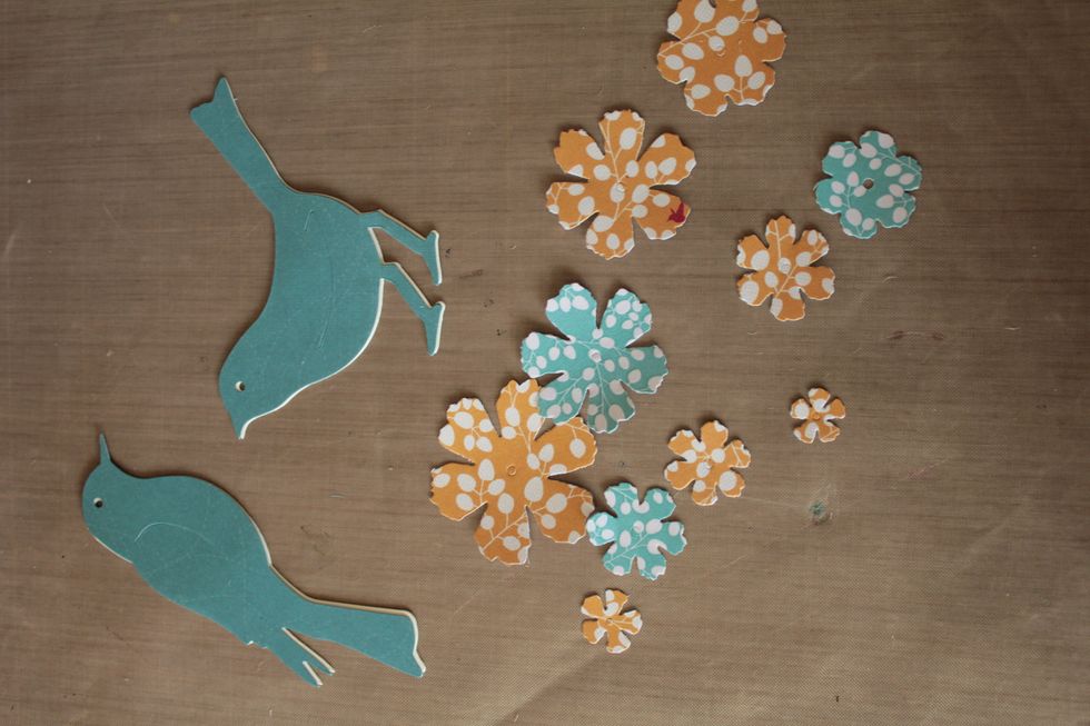 With your other coordinating papers that you have chosen to use, cut out some die cut shapes such as flowers and birds. Ink edges as desired. (See the supply list for the dies used for my project.)