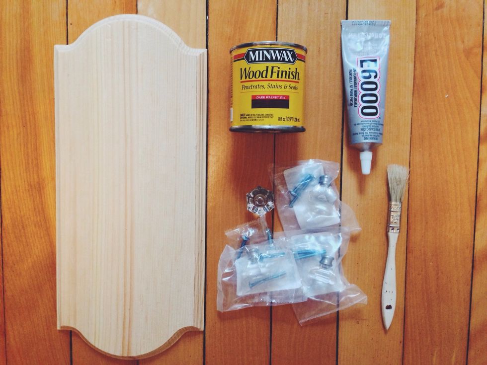 - Wood Block ($5 at Michaels)  - Wood Stain (they sell this at Michaels but it is half off at Home Depot)  - 4 drawer pulls (Home Depot) - E6000 glue or drill - Paint brush  - Command Hanging strips
