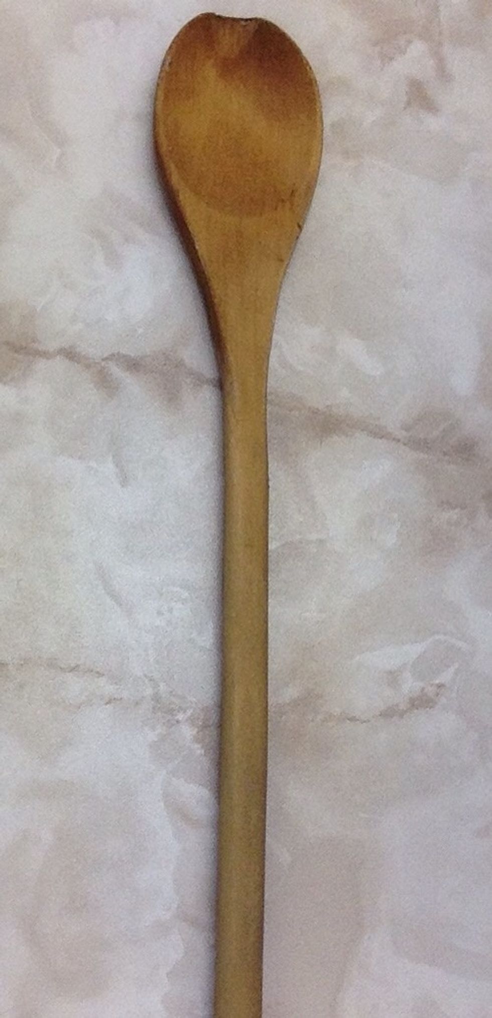 Wooden spoon. Used for mixing ingredients. I can use wooden spoons when mixing muffin batter.