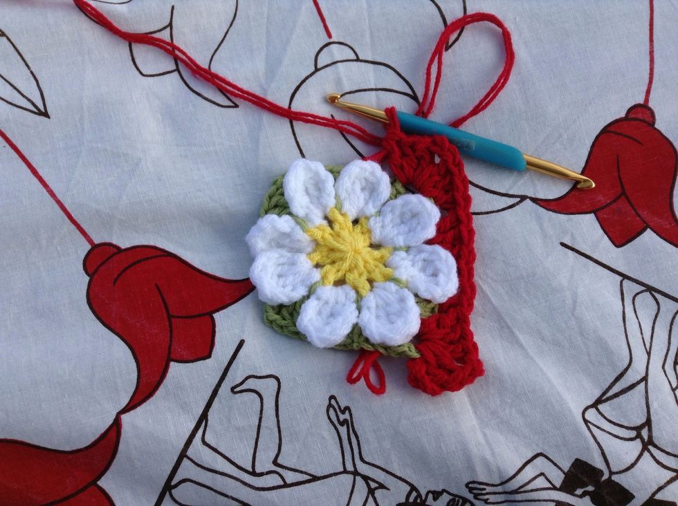 Work 3 dc, ch 2, 3 dc into the next corner space.