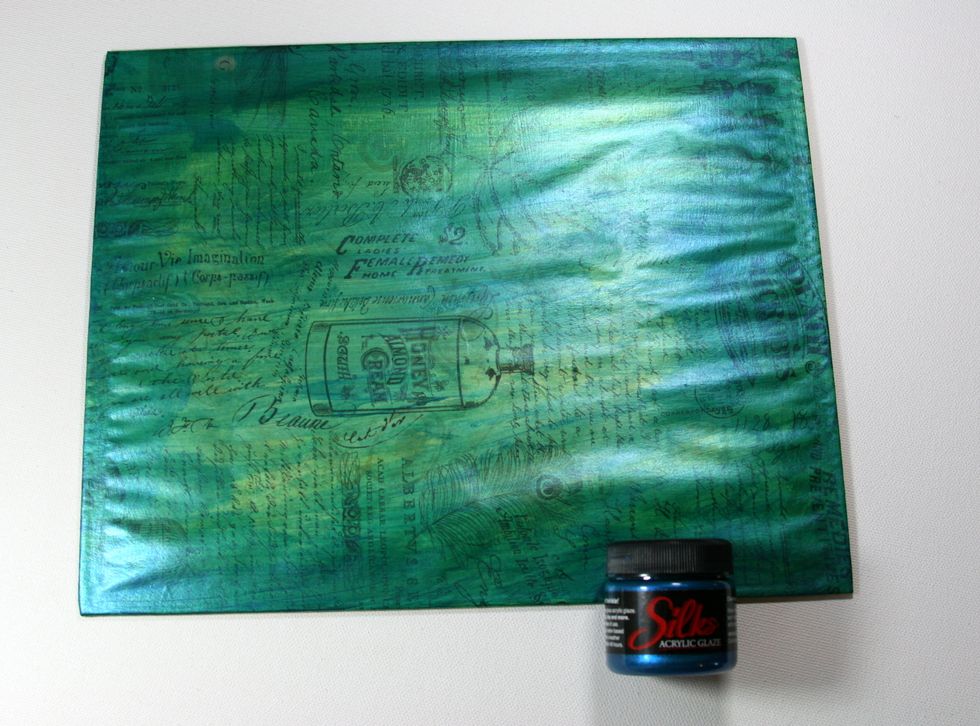 Work a coat of Meridian Blue Silks Acrylic Glaze around outside of prepared panel.