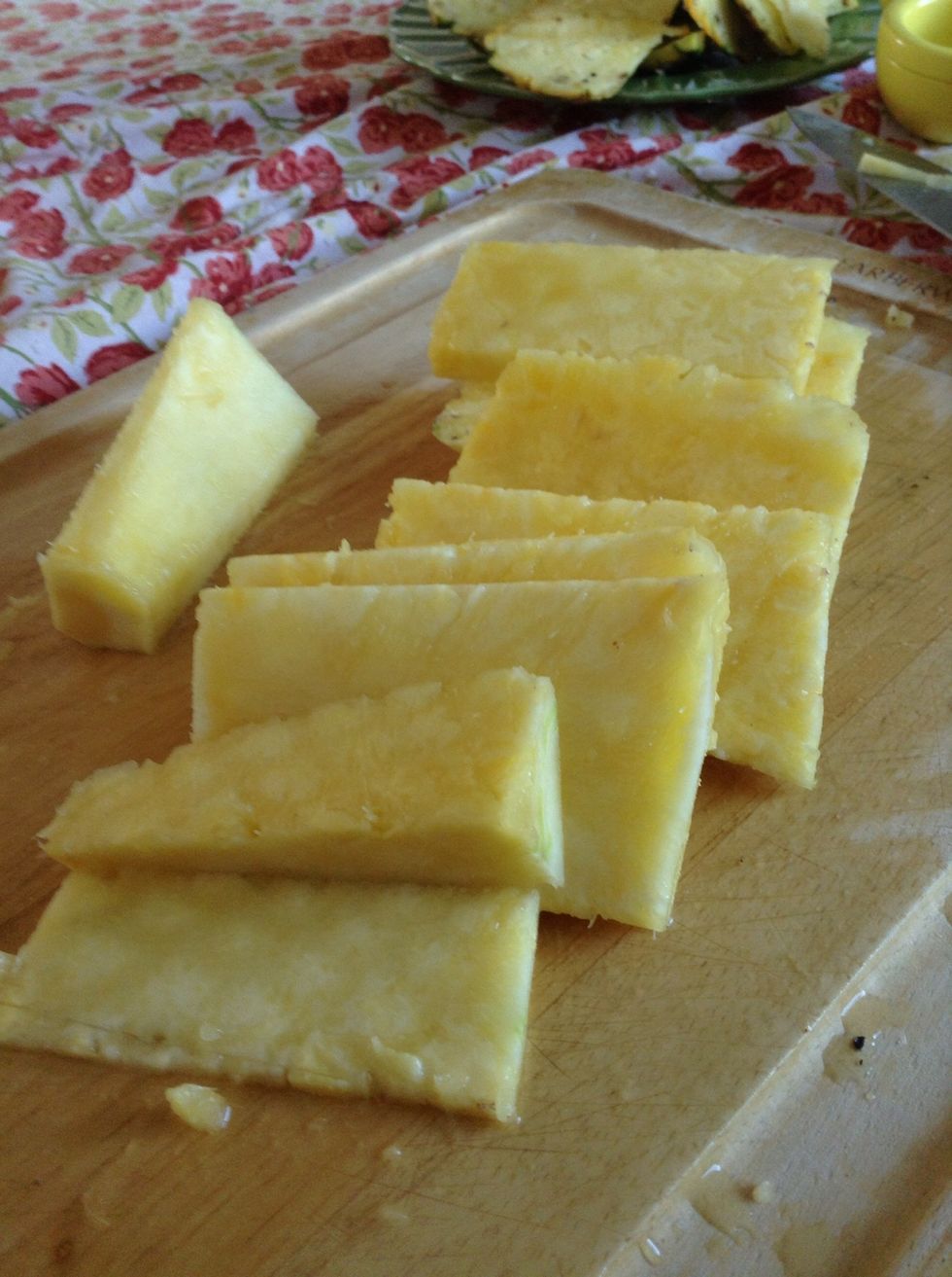 Work around the pineapple core because that that is a tough fibrous piece you'll not want to eat (see it on the upper left of the picture).
